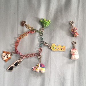 Kids Charm Bracelet Lot With Charms, some show signs of wear.